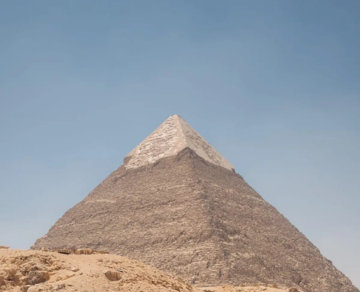 A pyramid at Giza under a clear sky